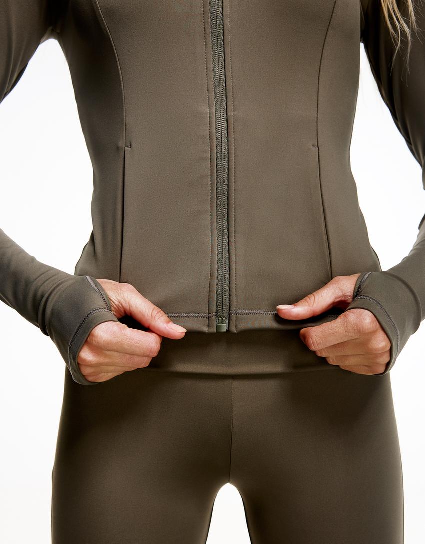 SWEAT ZIPPÉ À SÉCHAGE RAPIDE ET RESPIRANT