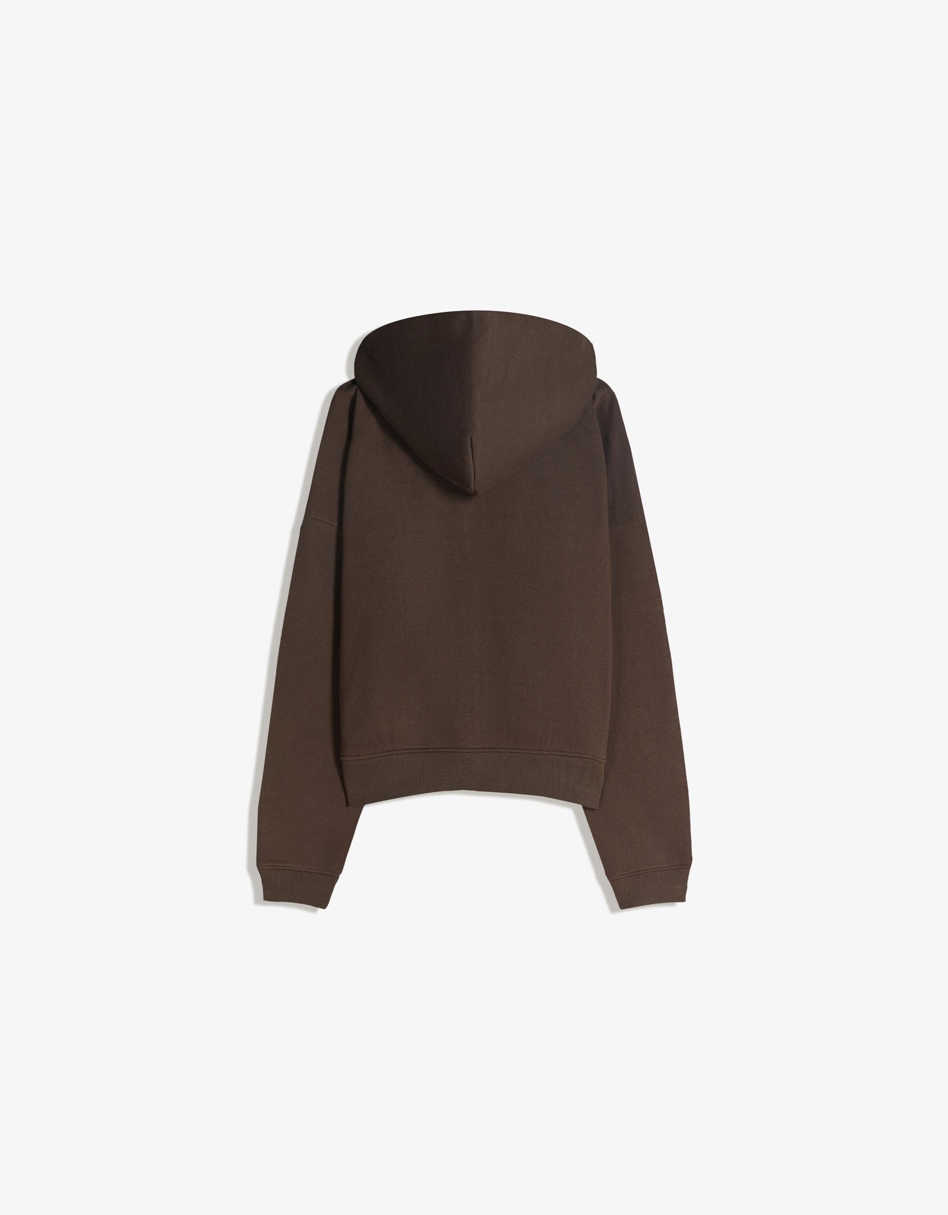 SWEAT ZIPPÉ OVERSIZE À CAPUCHE