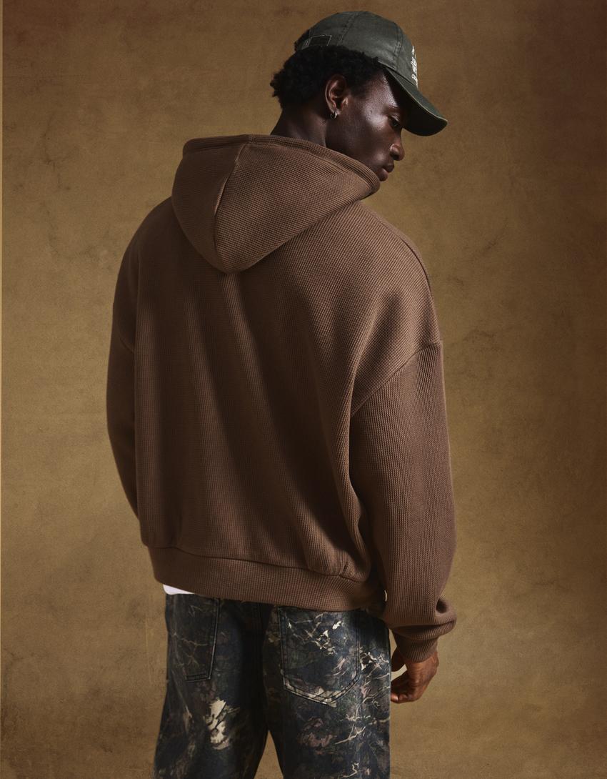 SWEAT ZIPPÉ GAUFRÉ