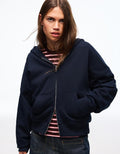 SWEAT ZIPPÉ OVERSIZE À CAPUCHE
