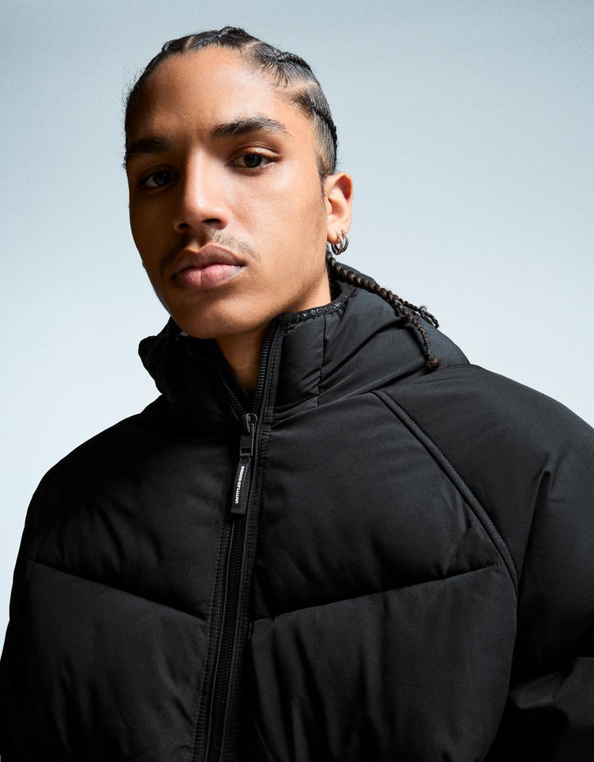 BLOUSON BOUFFANT À CAPUCHE