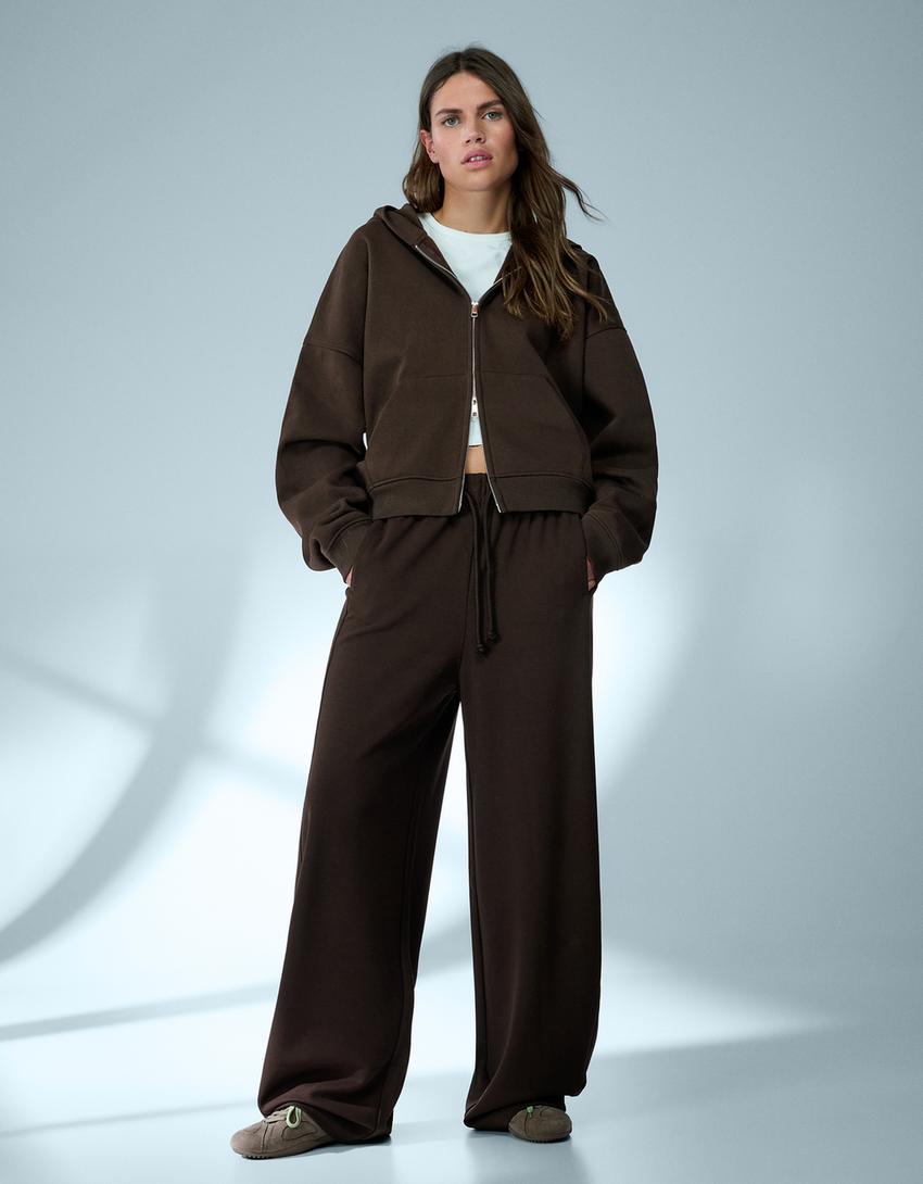 SWEAT ZIPPÉ OVERSIZE À CAPUCHE