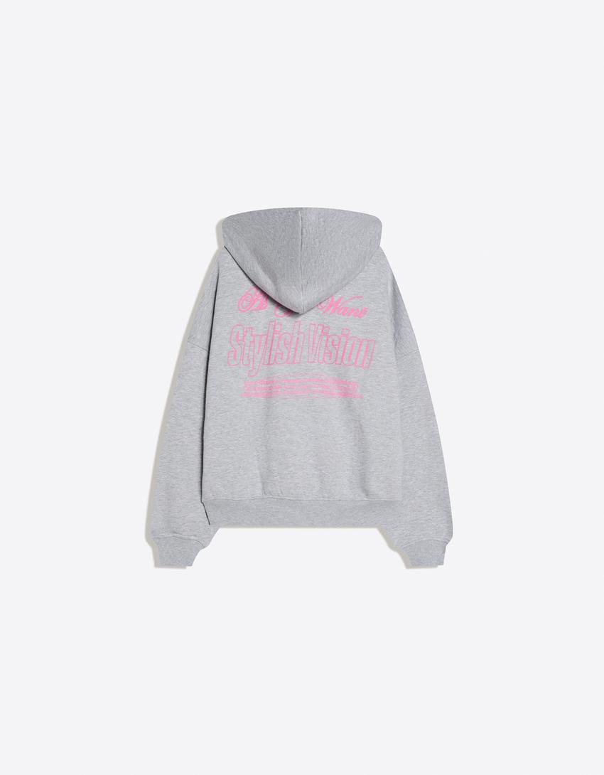 SWEAT OVERSIZE ZIPPÉ À CAPUCHE IMPRIMÉ