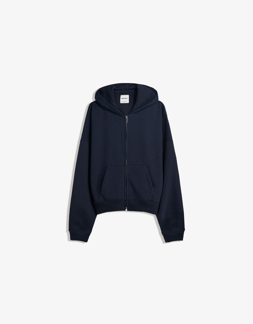 SWEAT ZIPPÉ OVERSIZE À CAPUCHE