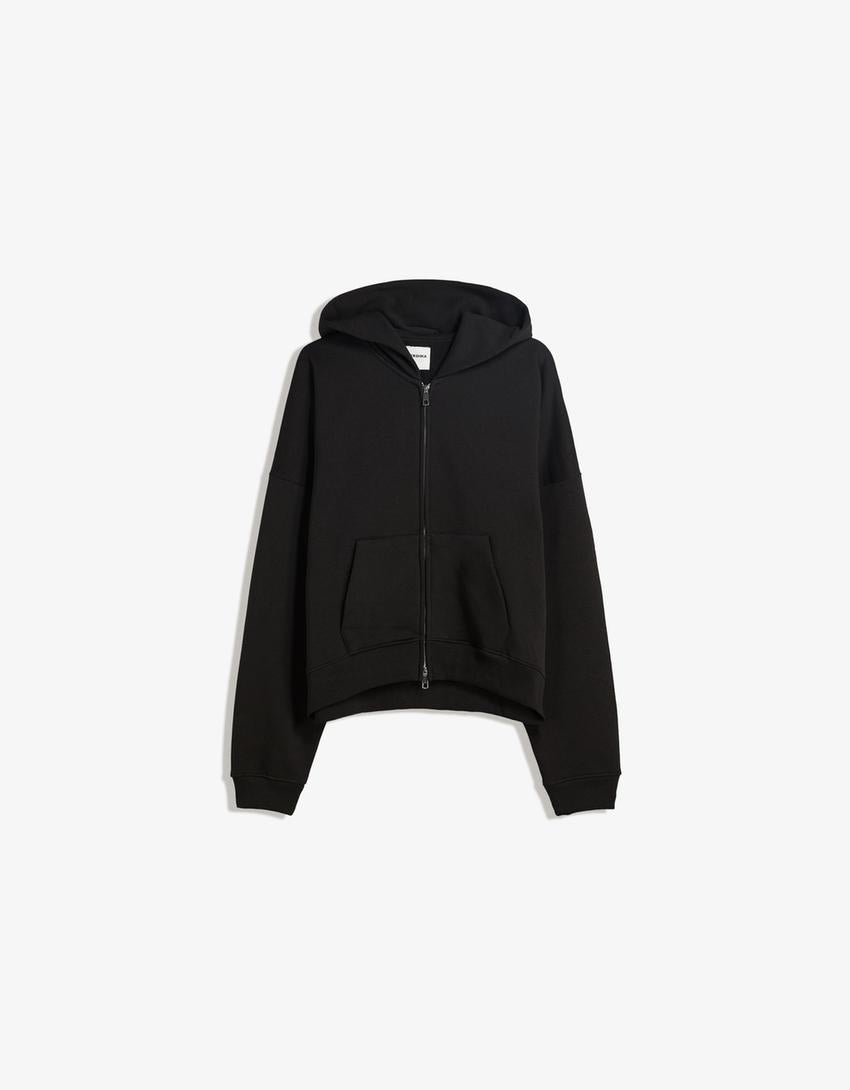 SWEAT ZIPPÉ OVERSIZE À CAPUCHE