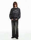 PANTALON FLARE À CLOUS