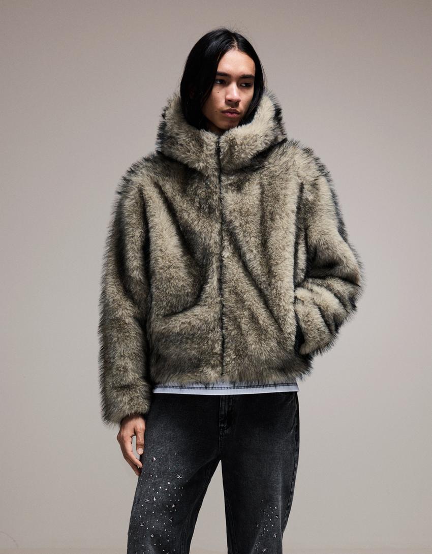 BLOUSON FAUSSE FOURRURE À CAPUCHE