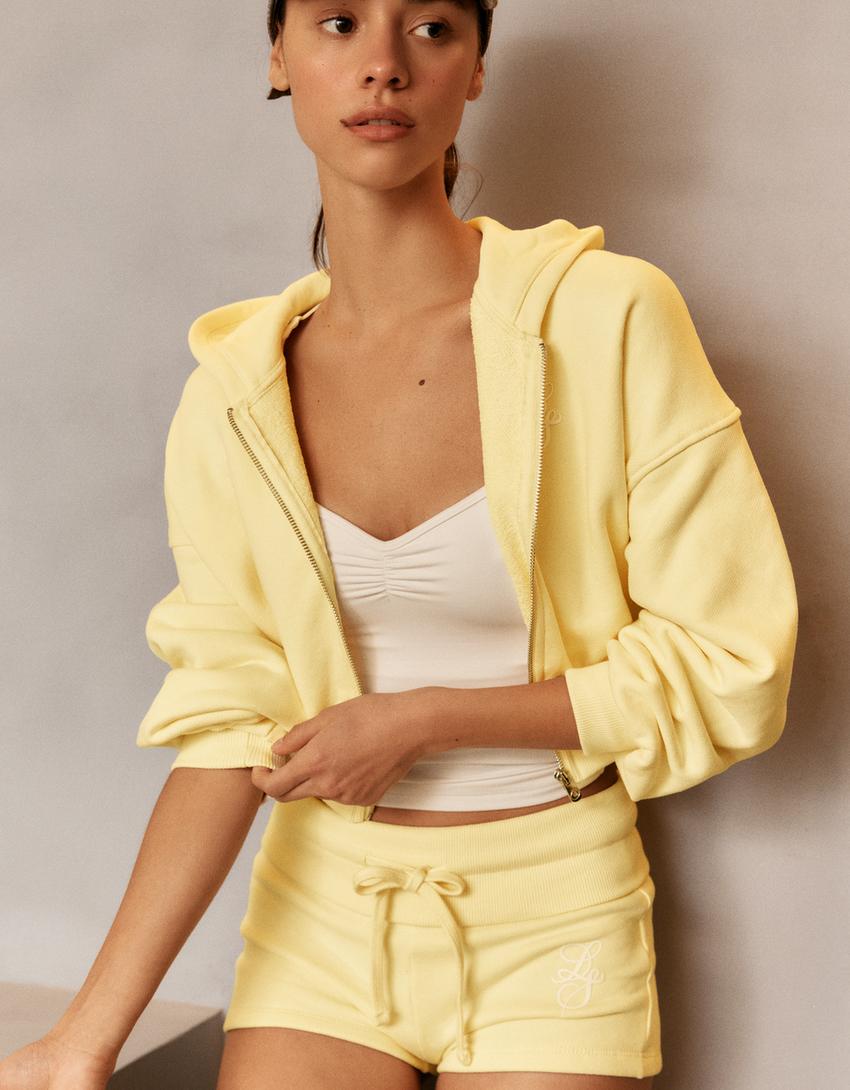 SWEAT ZIPPÉ À CAPUCHE