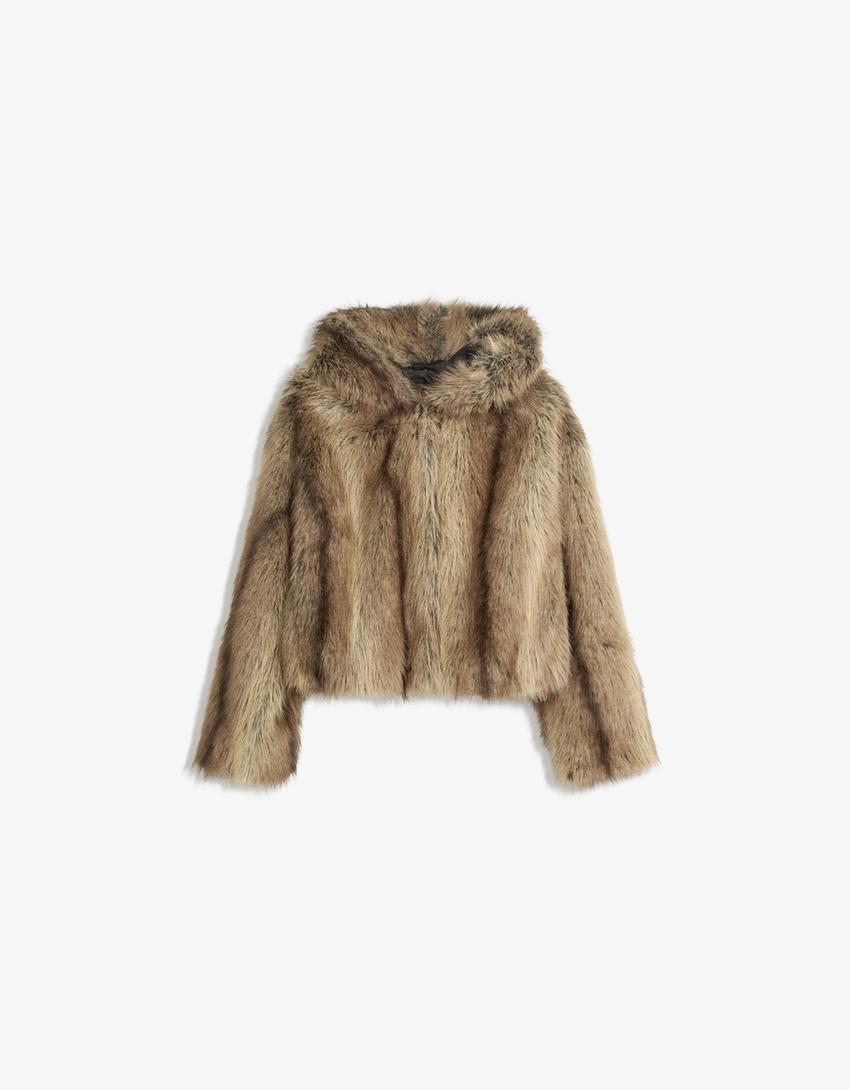 VESTE FAUSSE FOURRURE À CAPUCHE