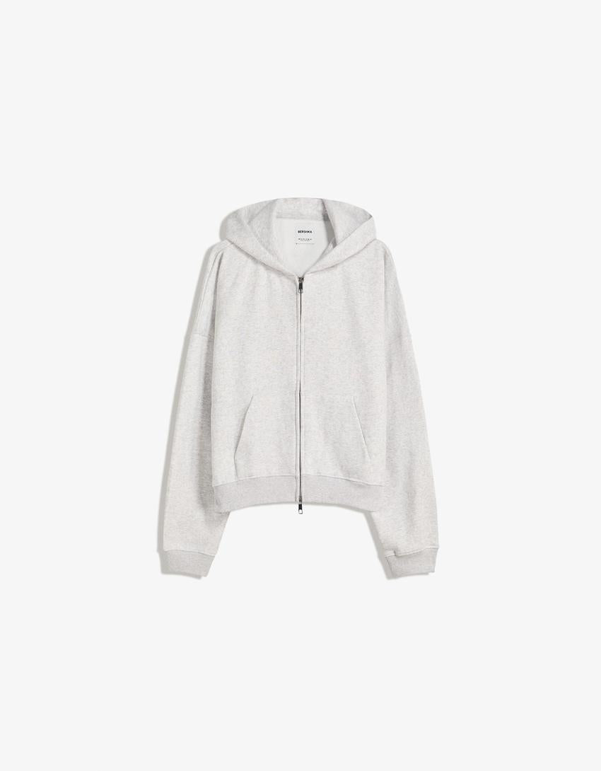 SWEAT ZIPPÉ OVERSIZE À CAPUCHE
