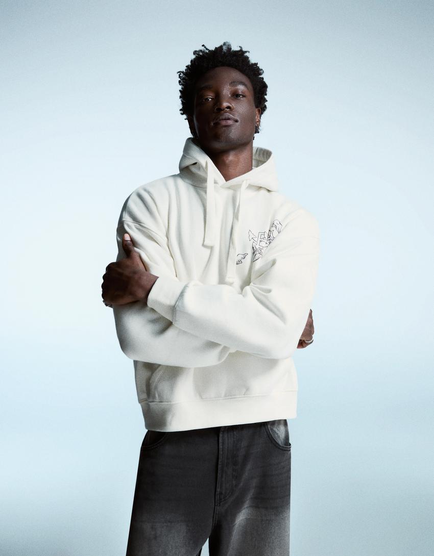 SWEAT CAPUCHE IMPRIMÉ