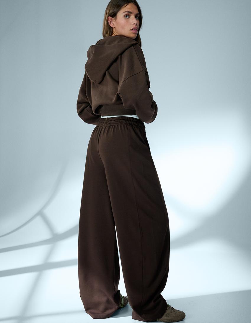 SWEAT ZIPPÉ OVERSIZE À CAPUCHE