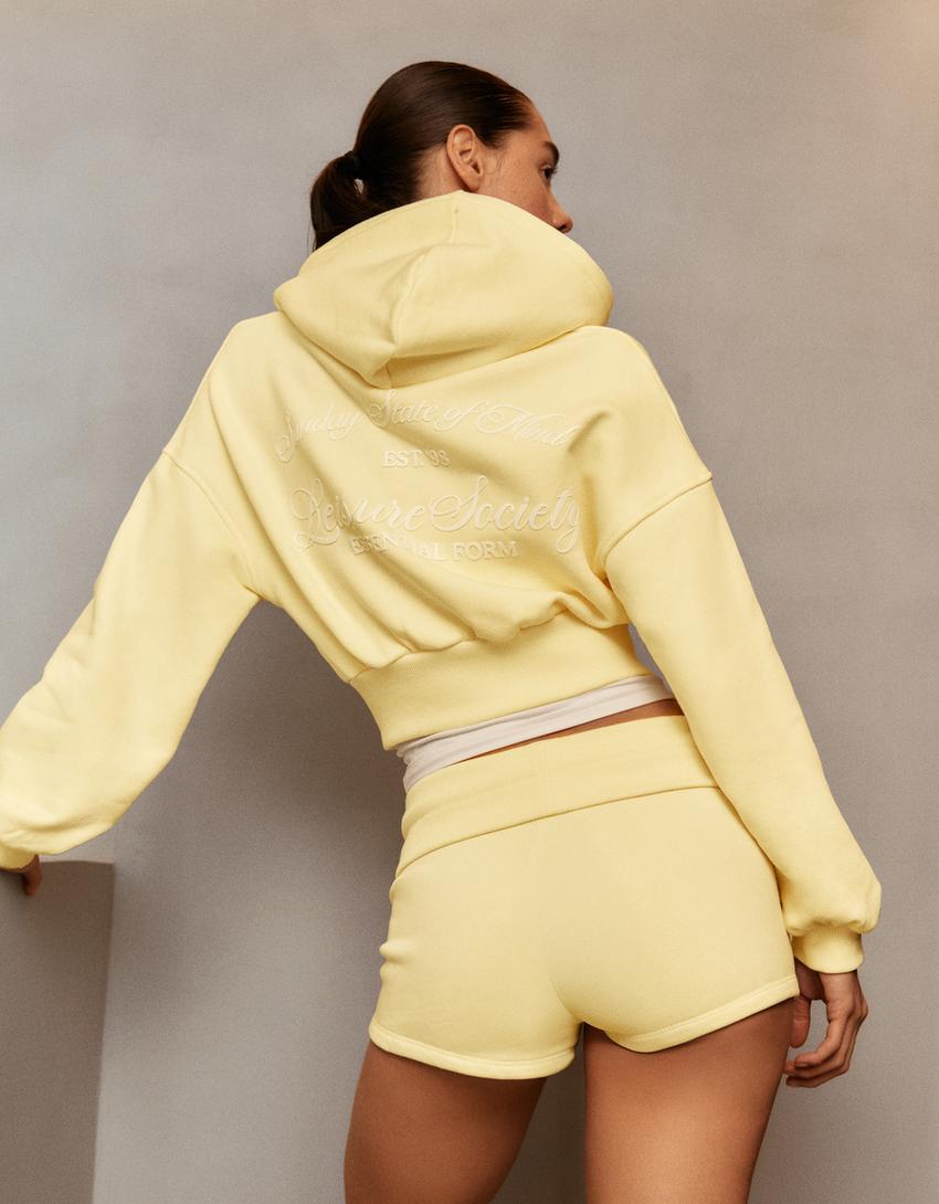 SWEAT ZIPPÉ À CAPUCHE