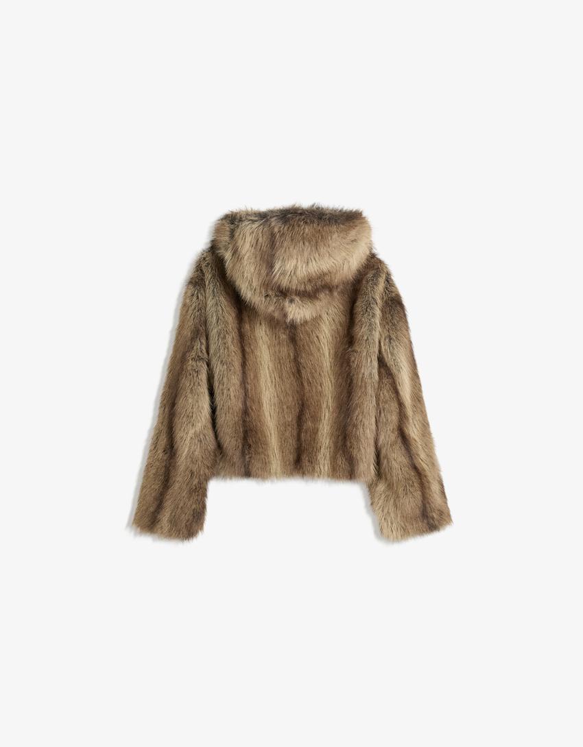 VESTE FAUSSE FOURRURE À CAPUCHE