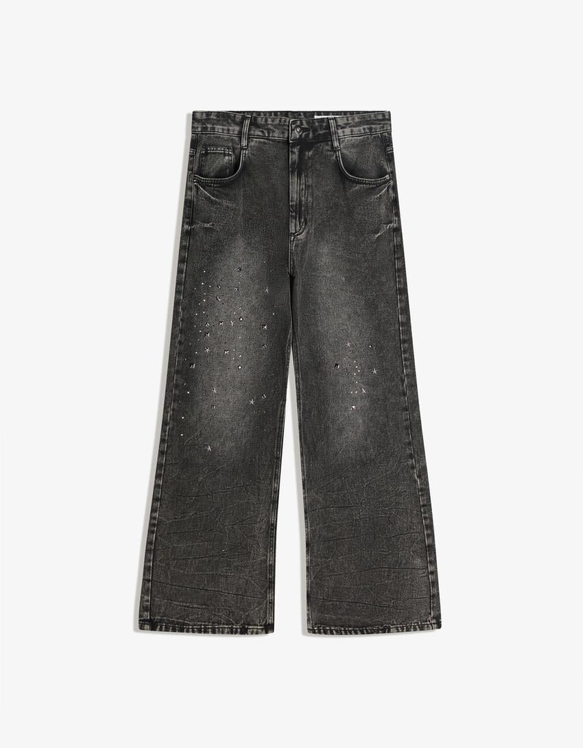 PANTALON FLARE À CLOUS