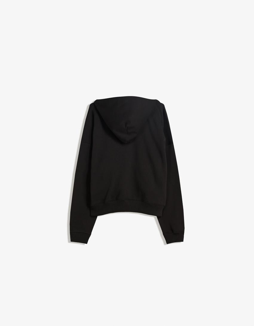 SWEAT ZIPPÉ OVERSIZE À CAPUCHE