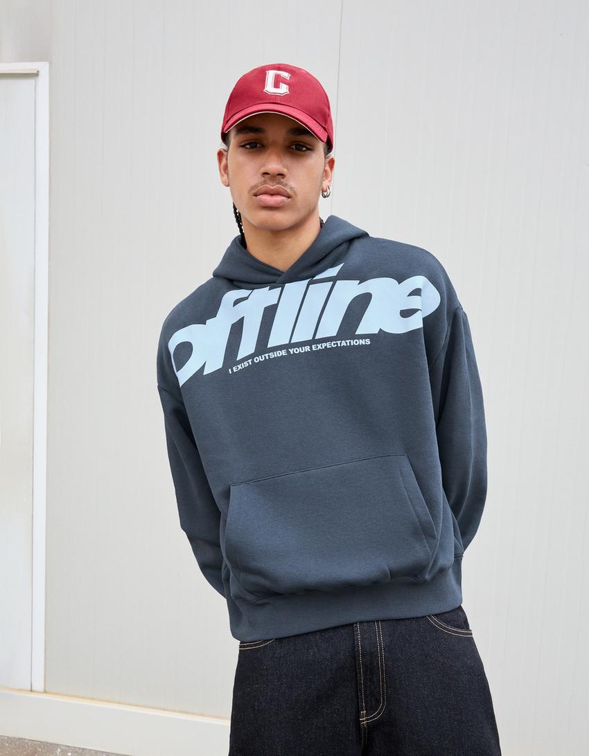 SWEAT À CAPUCHE IMPRIMÉ