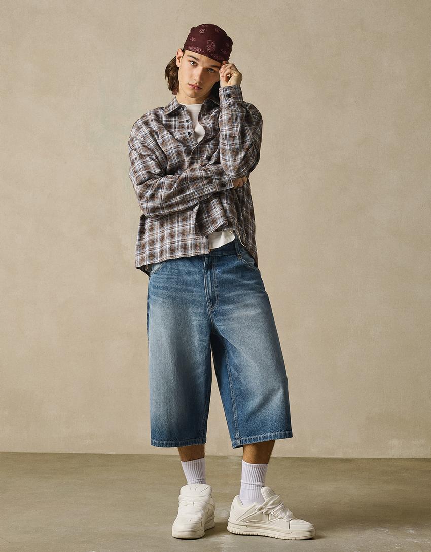 BERMUDA EN DENIM SUPER BAGGY FIT